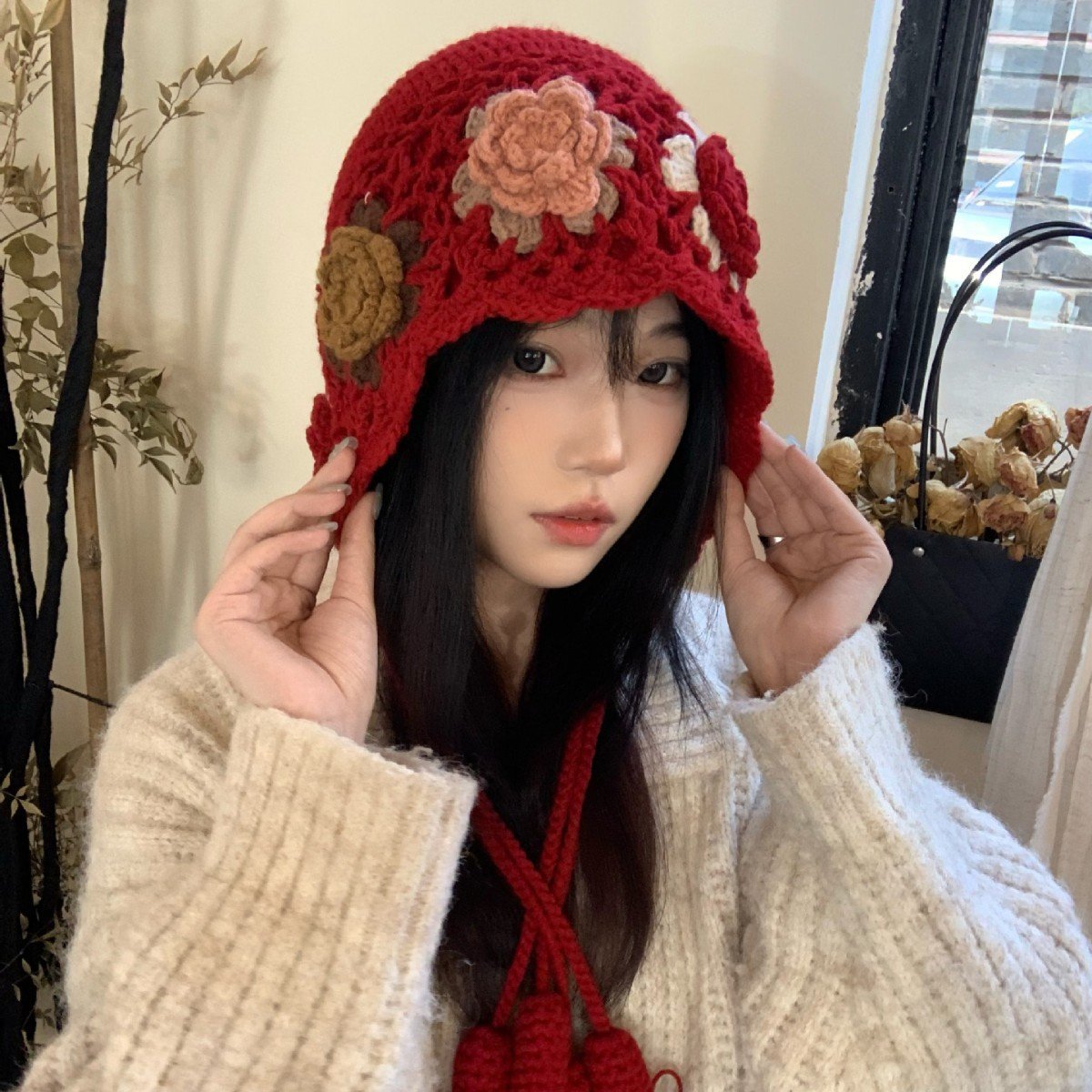 O1CN01WOetxY1KQPj8rkRAc_!!2217978711158-0-cib Handmade Crochet Red Winter Hat with Flower Design - Knitted Wool Cap with Tassels - Image 1